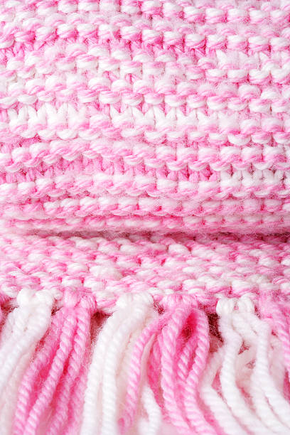 istock Woolen knitted scarf close-up 618858388