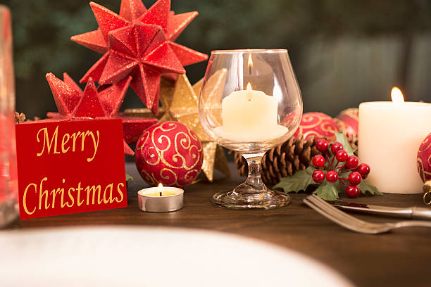 istock Dining table place setting with Merry Christmas decorations. 618858838