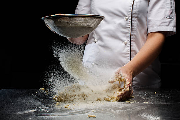istock Woman hands kneading dough. 618862150