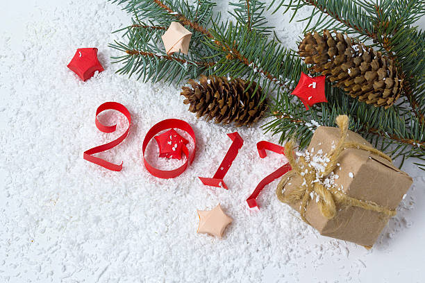istock Figures cut from paper, Christmas tree and cones. New Year 618862384