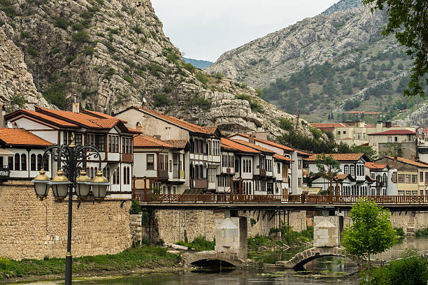 istock Ottoman houses reflected in the river, Amasya, Turkey 618862418