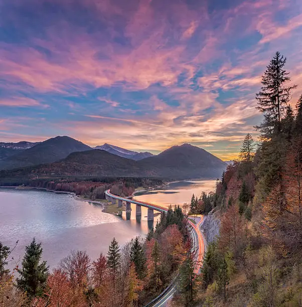 Long exposure of Sylvensteinsee at sunset in autumn