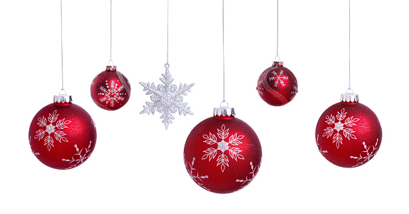 Christmas Ornament Baubles and Decorations In a Row Hanging Isolated on White