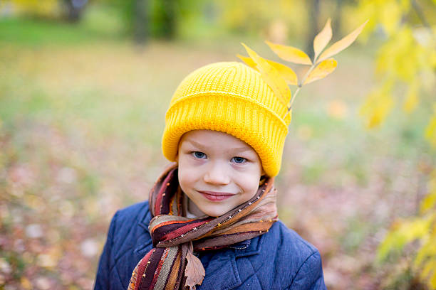 istock Young boy Autumn Park 618864354