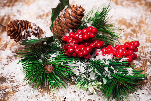 istock Decorative branch   on wooden board with snowflakes 618866322