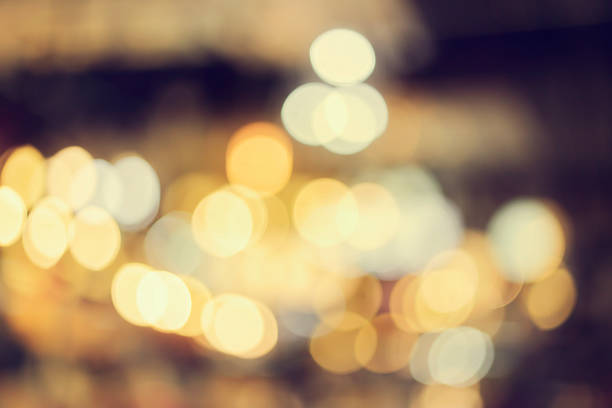 istock blur light bokeh abstrac background in vintage concept 618867336