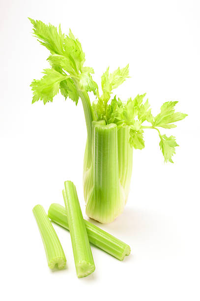 istock Fresh green celery isolated on white background cutout 618867818