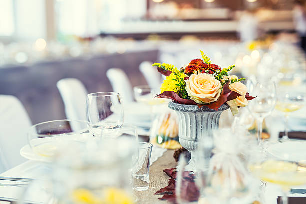 istock Wedding table. Flowers arrangement bouquets as decoration for wedding 618871902