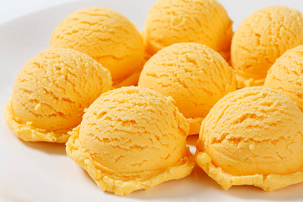 istock Scoops of apricot ice cream 618873996