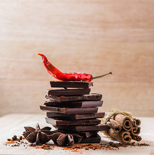 chile seco, chocolate y otras especias - badian fotografías e imágenes de stock
