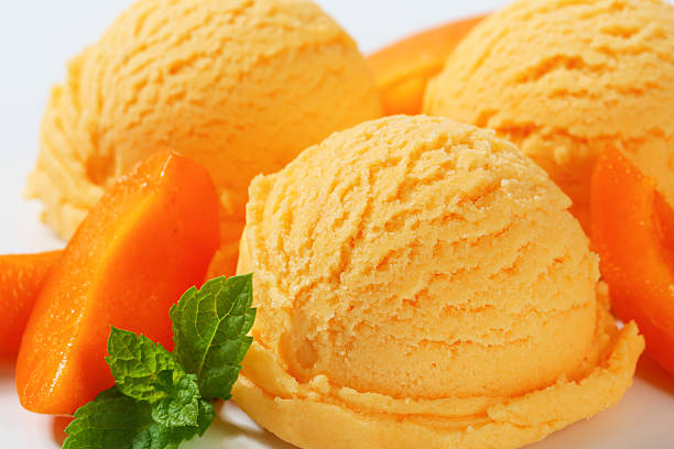 istock Scoops of apricot ice cream 618874054