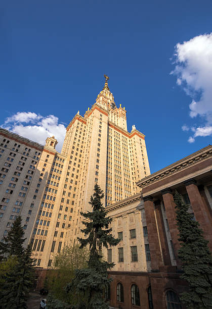 istock Wide angle view of Moscow university under cloudy blue sky 618874548
