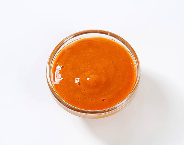 istock Bowl of apricot jam 618874608