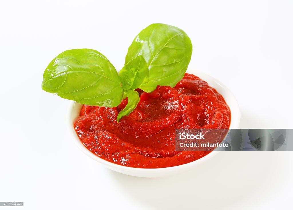 Tomato sauce Tomato sauce with basil leaves Backgrounds Stock Photo