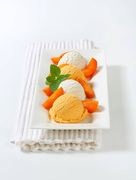 istock Scoops of apricot ice cream 618875000