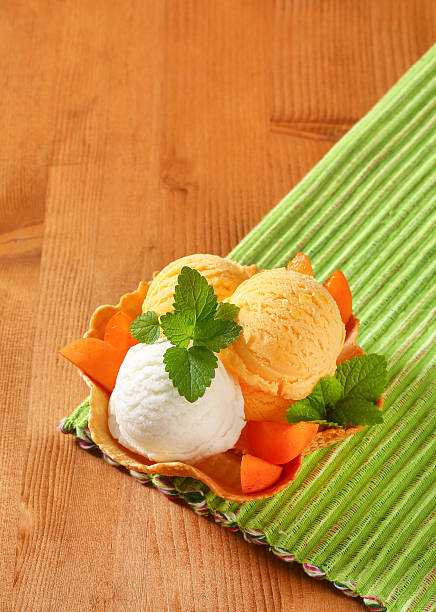 istock Scoops of apricot ice cream 618935734