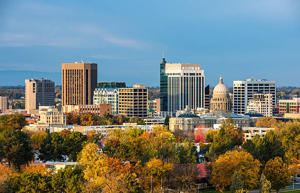 Autumn trees and the skyline of Boise Idaho City of trees Boise Idaho with fall colors idaho stock pictures, royalty-free photos & images