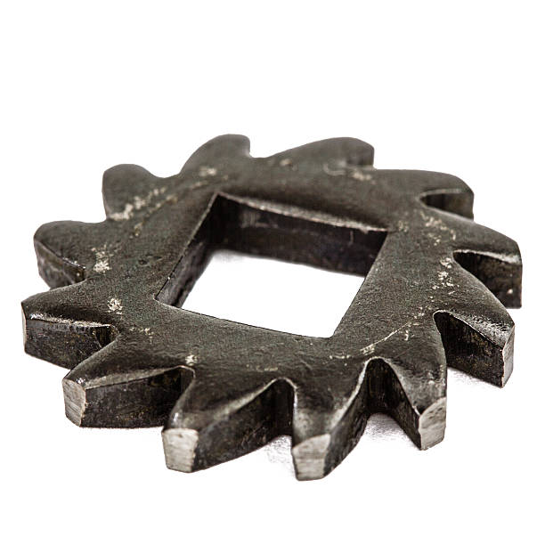 istock One gear wheel from metal closeup, isolated on white background 618936480