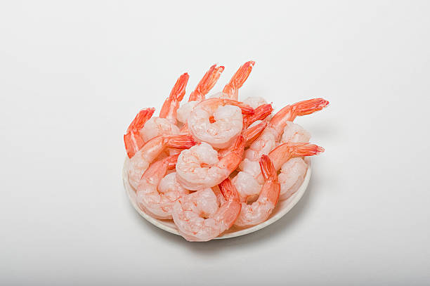 istock peeled prawns on a plate 618936970
