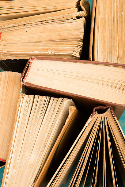 istock Old and used hardback books or text books 618937008