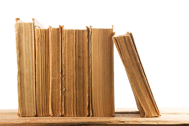 istock Stack of old and used hardback books isolated 618937280