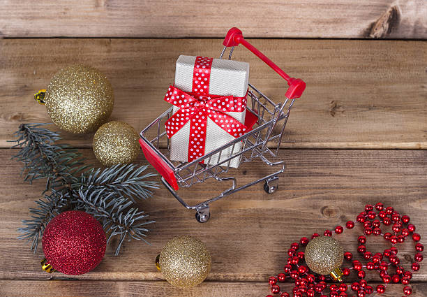 istock Christmas shopping background composition over the wooden surface 618937584