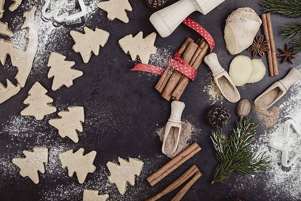 istock Frame of Christmas cookies and spices over rustic table 618939062