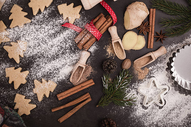 istock Frame of Christmas cookies and spices over rustic table 618939418
