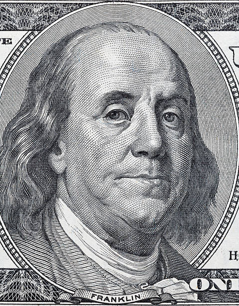 istock Benjamin Franklin portrait on one hundred dollar bill closeup 618940434