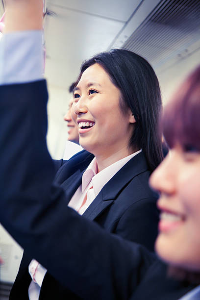 istock Young woman riding public transportation 618941454