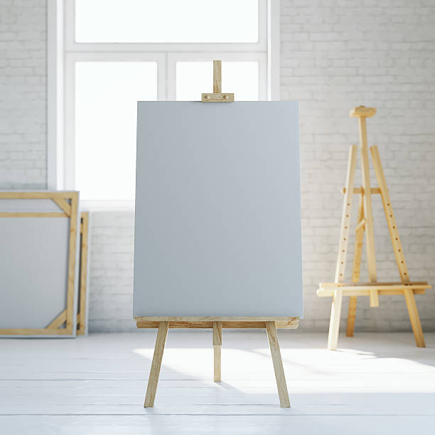 istock Wooden easel with blank white canvas in loft interior. 3d 618942016