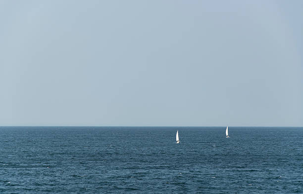 Sailing boats at sea stock photo