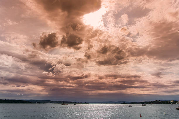 Cloudy sky over the bay at dusk stock photo