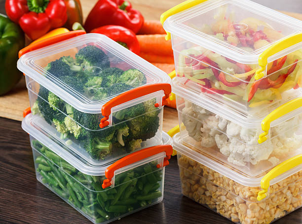 istock Trays with raw vegetables for freezing. 618943114