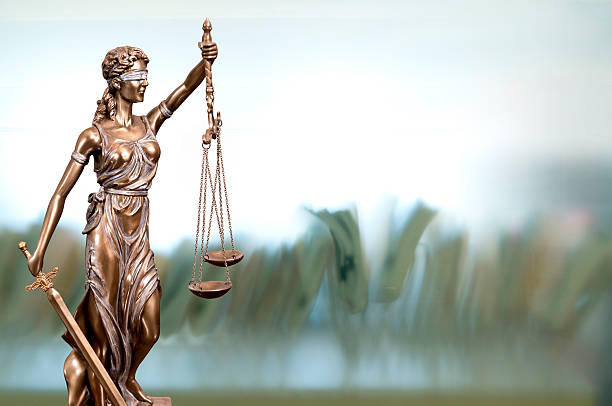 istock Statue Of Lady Justice In An Office 618943674