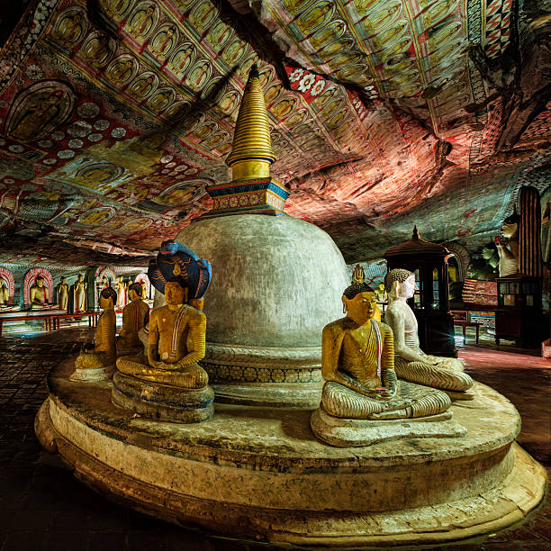 istock Buddha statue inside Dambulla cave temple, Sri Lanka 618943840