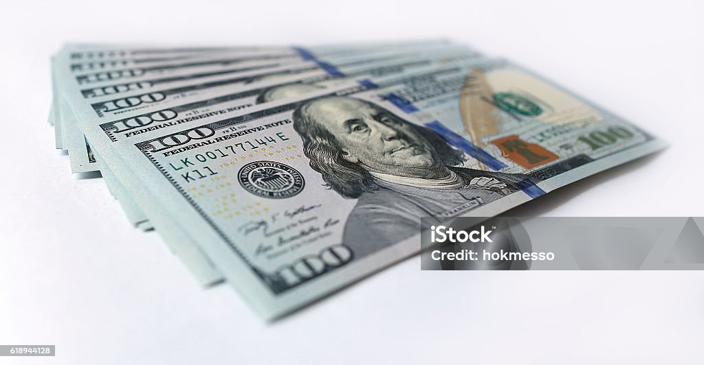 US dollar on white background American One Hundred Dollar Bill Stock Photo