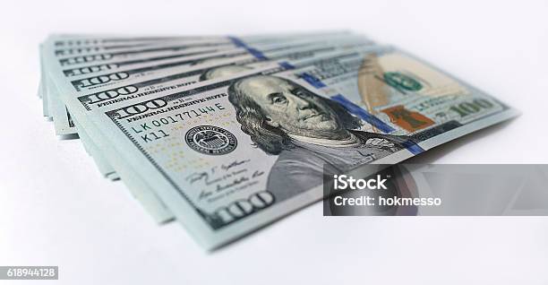 Us Dollar On White Background Stock Photo - Download Image Now - American One Hundred Dollar Bill, Close-up, Closed