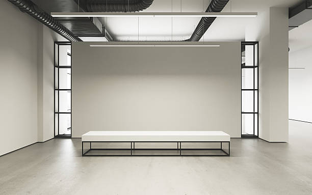 istock Mockup of light empty exhibition gallery with bench. Concrete floor 618944272