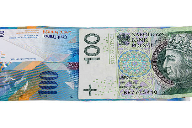 istock Banknotes of 100 PLN and swiss franc 618944530