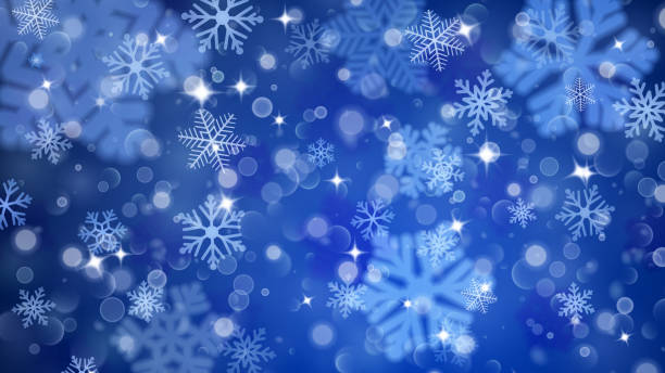 istock Christmas background of fuzzy and focused snowflakes 618945186