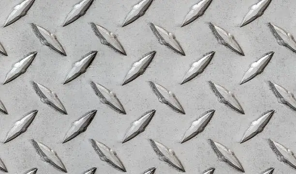 Photo of metal diamond pattern non-skid gray wrap around texture seamless tile