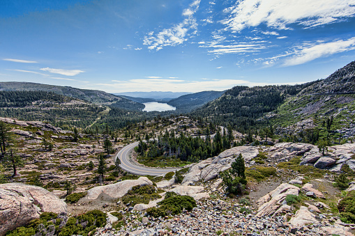 Grand vista of the Sierra Nevada mountains from the Summit at 7,000 feet looking out over the Tahoe National Forest with Donner Lake in the distance