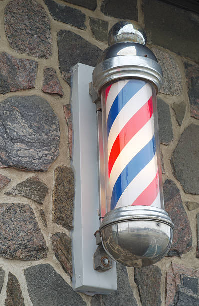 istock barber shop pole red blue and white strip sign 618948294