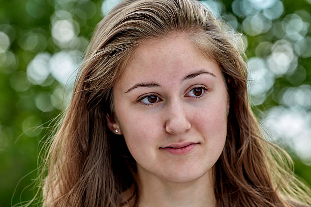 istock Contemplative Young Woman Smiling 618950842