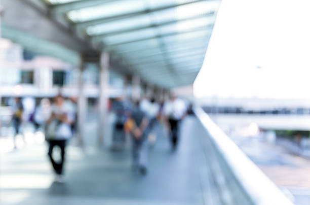 istock Abstract background of people on footbridge 618951170