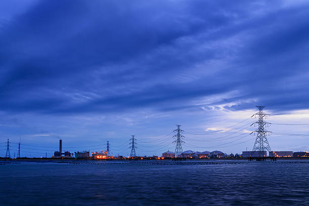 istock High voltage power pole in the sea. 618951860