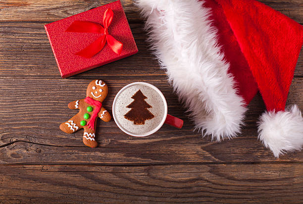 istock Christmas cappuccino and gingerbread cookies 618952668