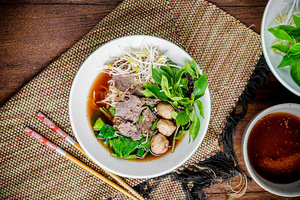 istock asian noodle soup with beef meatball with fresh vegetable 618953480
