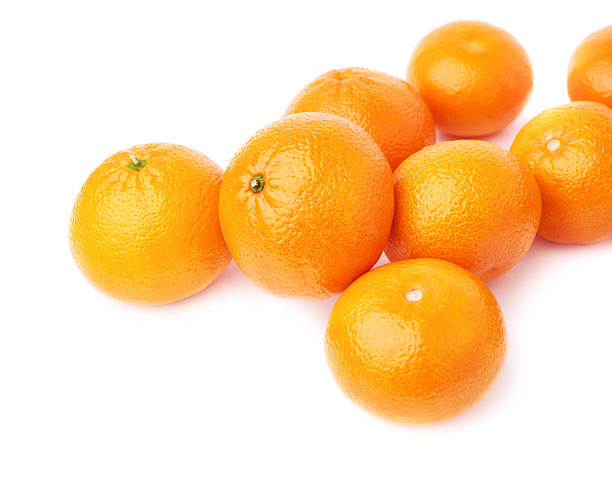istock Surface covered with multiple ripe fresh juicy tangerines, composition isolated 618953690
